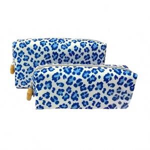 NEW TRVL DESIGN women's cosmetic travel bag in blue cheetah